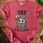 T-shirt with skeleton grim reaper reading book and text "IBS I BE SLAYIN'".