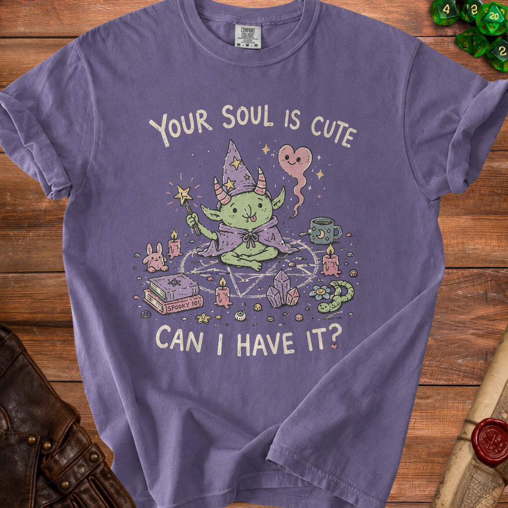 Purple t-shirt with a cute green goblin wizard, stars, and text "Your soul is cute. Can I have it?".