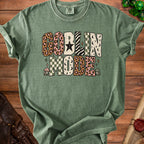 Green t-shirt with "Goblin Mode" text in various patterns and mushroom accents.