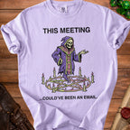 Lilac t-shirt with grim reaper graphic and text: THIS MEETING...COULD'VE BEEN AN EMAIL.