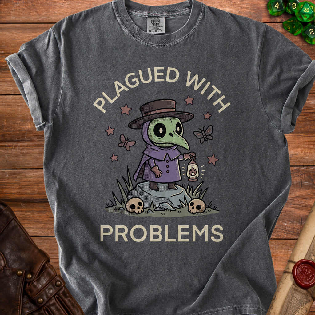 T-shirt graphic with plague doctor character, stars, butterflies, skulls, and text.