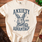 Cream t-shirt with navy graphic of a distressed rabbit and a twenty-sided die.