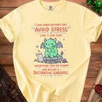 Yellow t-shirt with text and illustration of a dragon, with economy graph.