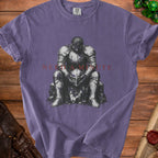 Purple t-shirt with a knight sitting and holding a helmet, "NEEDA MINUTE" text.