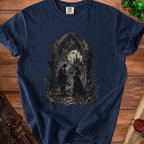 Dark blue t-shirt with gothic artwork of a couple in front of a castle.