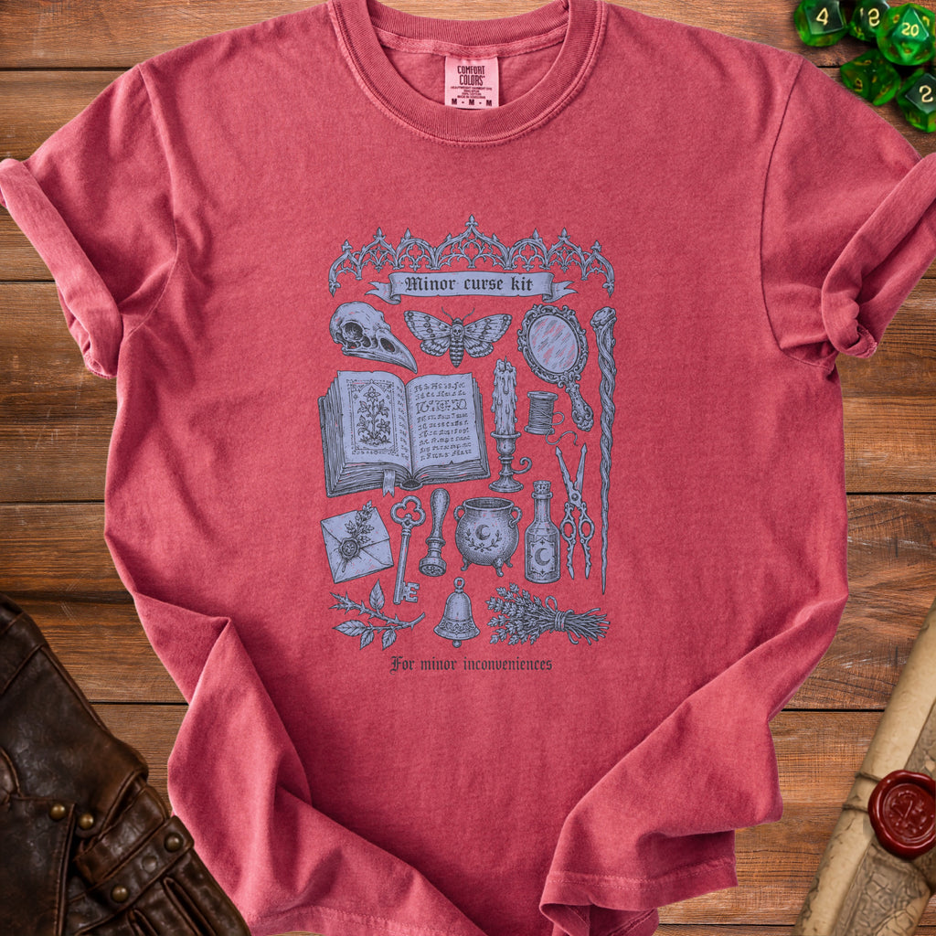 T-shirt with "Minor curse kit" graphic and gothic font text "For minor inconveniences".
