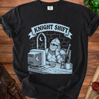 Black t-shirt with a knight in armor at a computer, text reads "KNIGHT SHIFT".