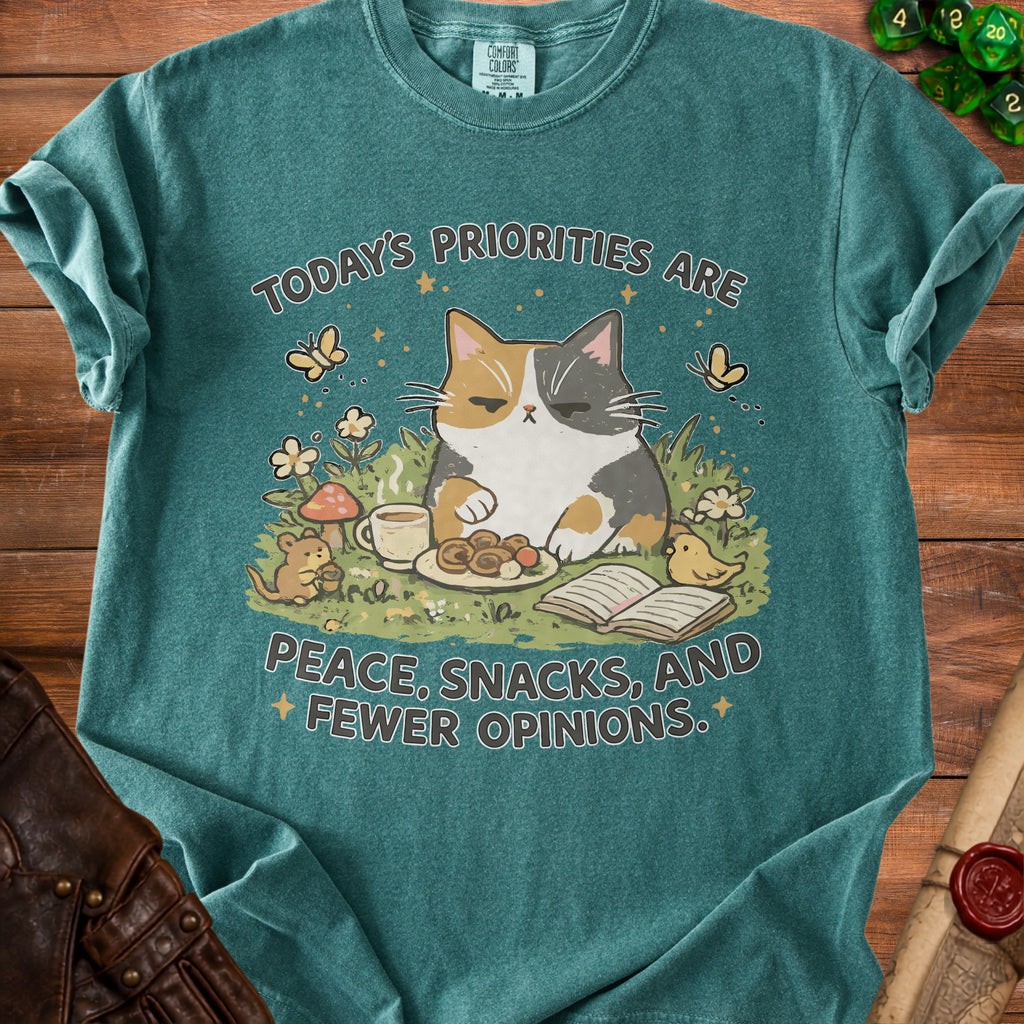 Calico cat with "Peace, Snacks, and Fewer Opinions" text.