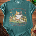 Calico cat with "Peace, Snacks, and Fewer Opinions" text.
