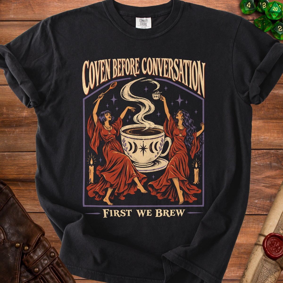 Black t-shirt with "Coven Before Conversation, First We Brew" and two women with coffee.