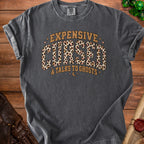 Gray t-shirt with "Expensive Cursed & Talks to Ghosts" text and leopard print.