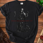 Black t-shirt featuring a plague doctor graphic and red text "SOCIAL DISTANCING SINCE 1347".