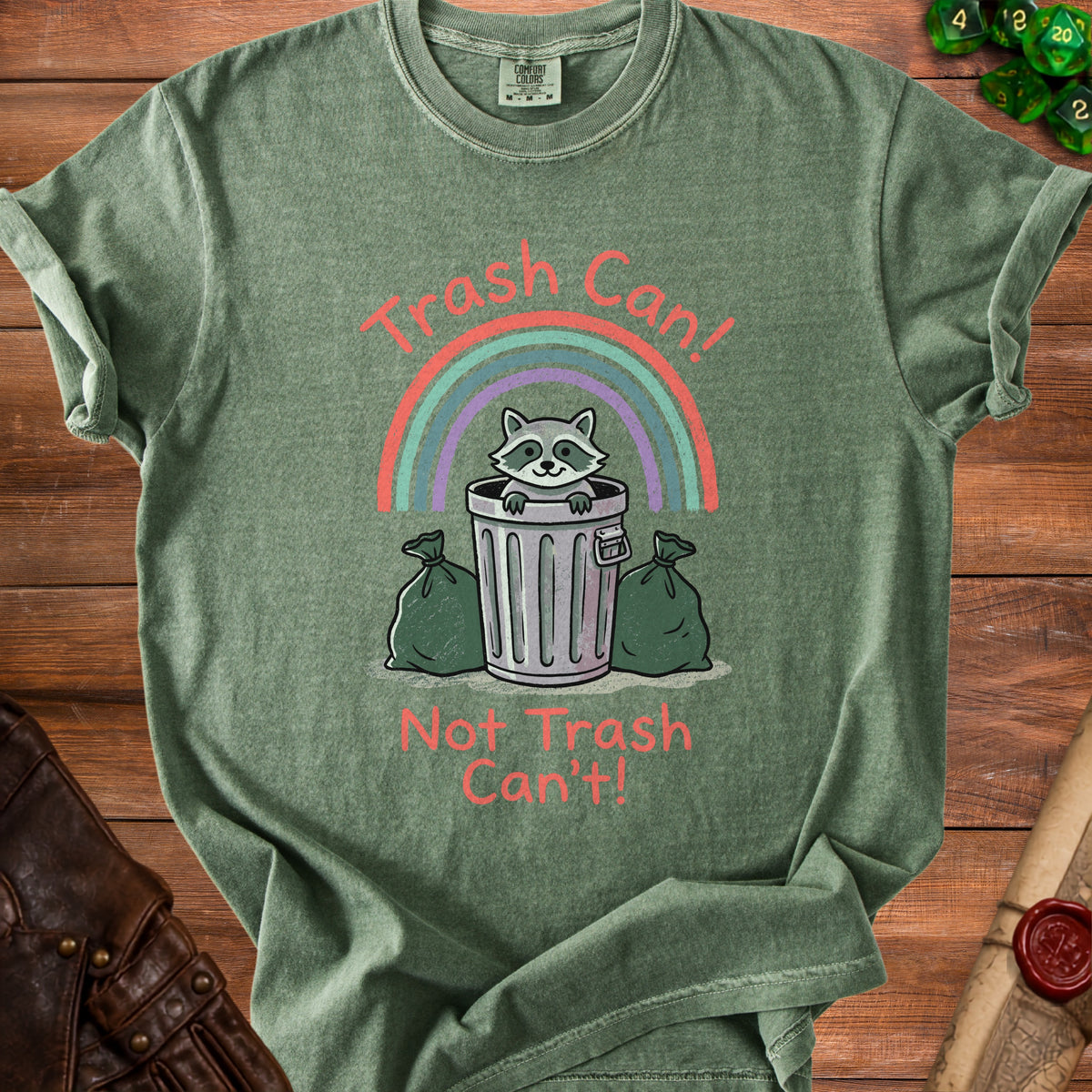 Green t-shirt with a raccoon in a trash can and the text "Trash Can! Not Trash Can't!".