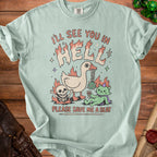 Light green t-shirt with "I'LL SEE YOU IN HELL" and "PLEASE SAVE ME A SEAT" text and cartoon graphics.