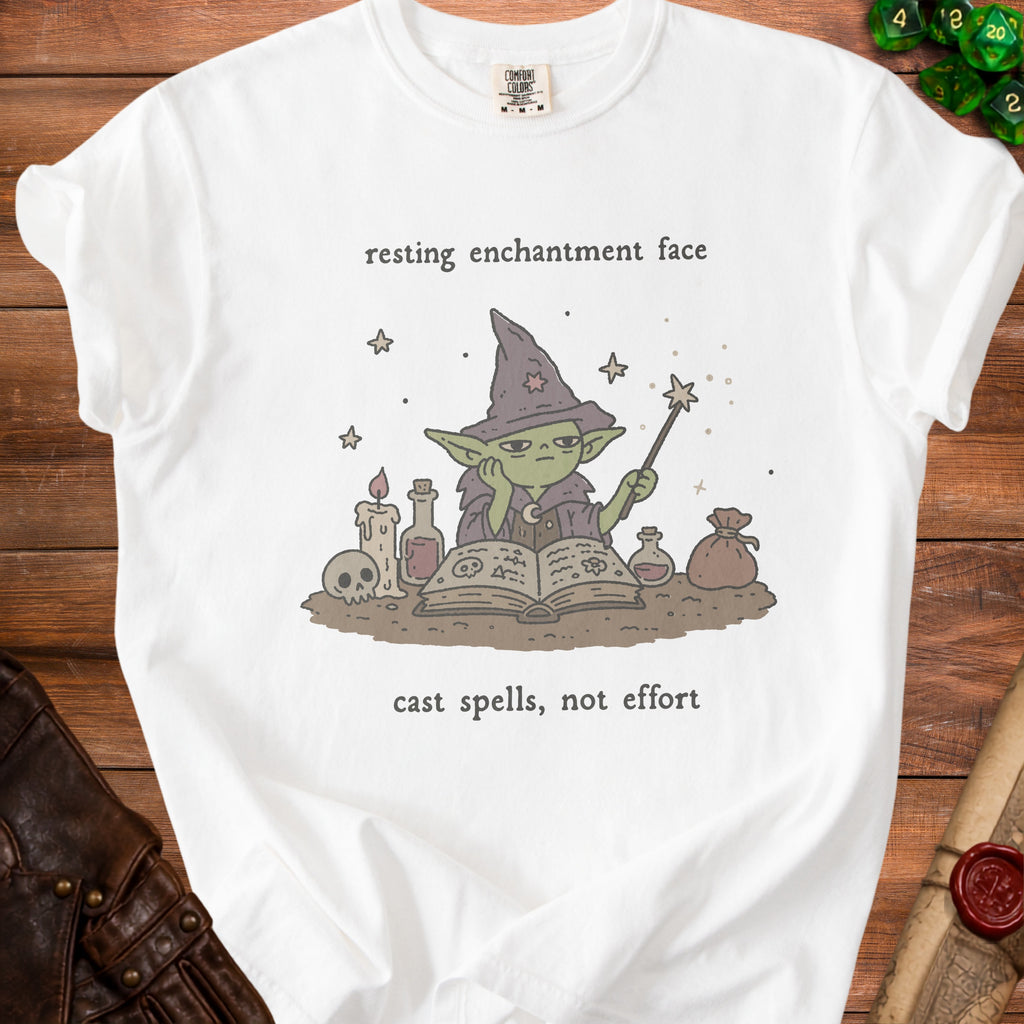 White t-shirt with a bored goblin wizard, spells, and "cast spells, not effort" text.
