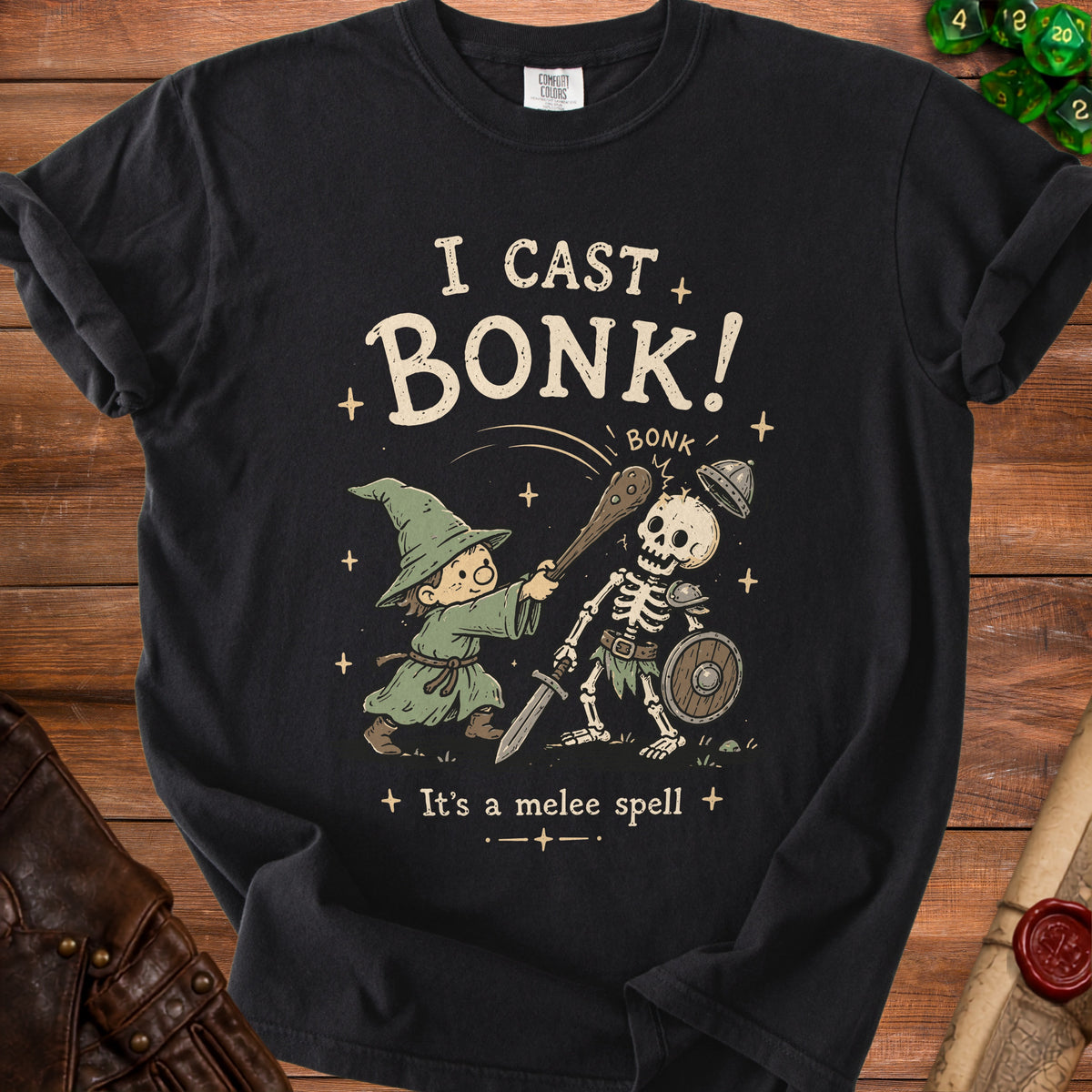 Black t-shirt with "I Cast Bonk! It's a melee spell" graphic featuring a wizard and skeleton.