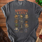 Dark gray t-shirt with "Dungeons & Cats" and various cat characters in fantasy roles.