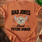 Orange t-shirt with "Dad Jokes Deal Psychic Damage" text and d20 die graphic.
