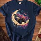 Wizard sleeping on moon with celestial background, staff and boots.
