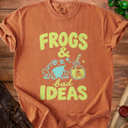 Orange t-shirt featuring the text Frogs and Bad Ideas with a frog and poison bottle graphic.