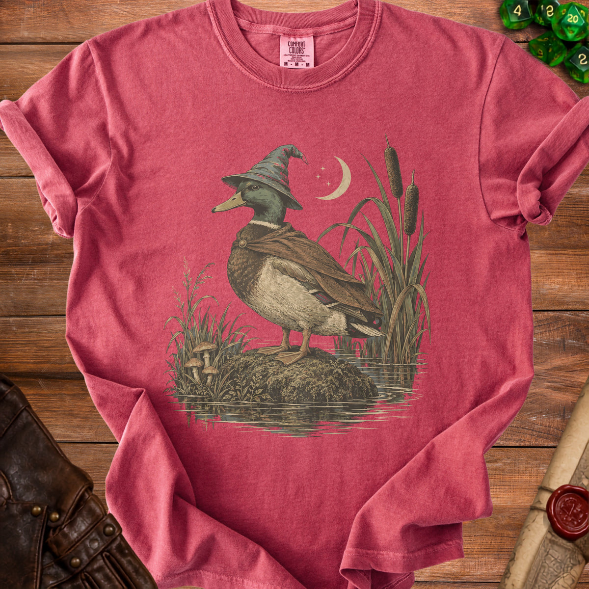 Mallard duck wearing a wizard hat and cloak in a marsh with a crescent moon.