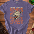 Purple t-shirt with a distressed graphic of a dog skull and the text "EVERYDAY MY HEAD GOES AAAAAAAA".