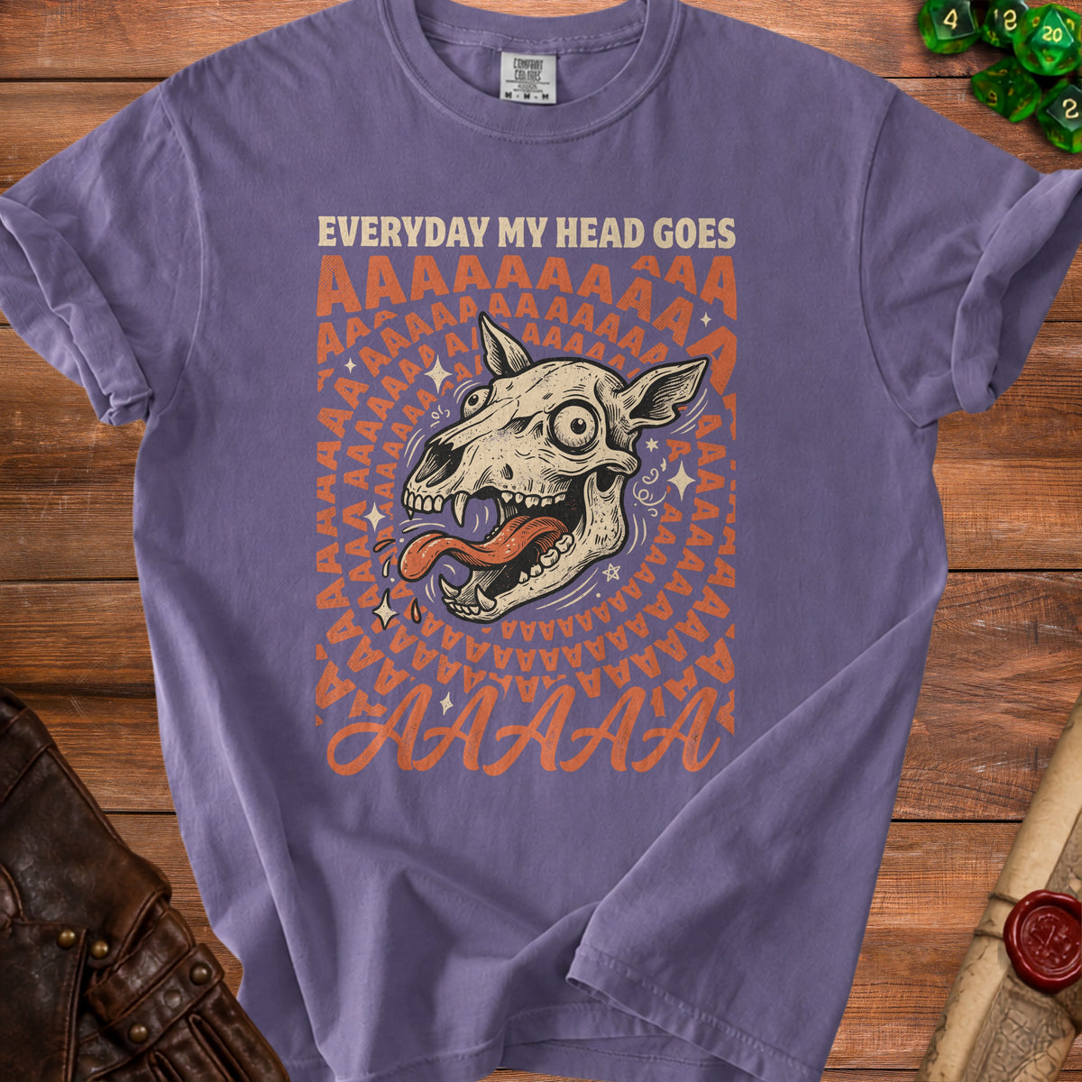 Purple t-shirt with a distressed graphic of a dog skull and the text "EVERYDAY MY HEAD GOES AAAAAAAA".