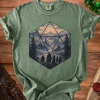 Green t-shirt with a D20 die graphic containing a fantasy landscape and adventurers.