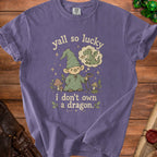 Purple t-shirt with gnome, dragon thought bubble, and text "yall so lucky i don't own a dragon."