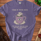 Purple t-shirt with "This is your sign to drink coffee and ignore everyone today" text.