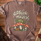 Goblin Hours t-shirt with a goblin, mushrooms, pumpkin, and bone graphic.