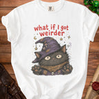 White t-shirt with "what if I got weirder" and a black cat in a witch hat graphic.
