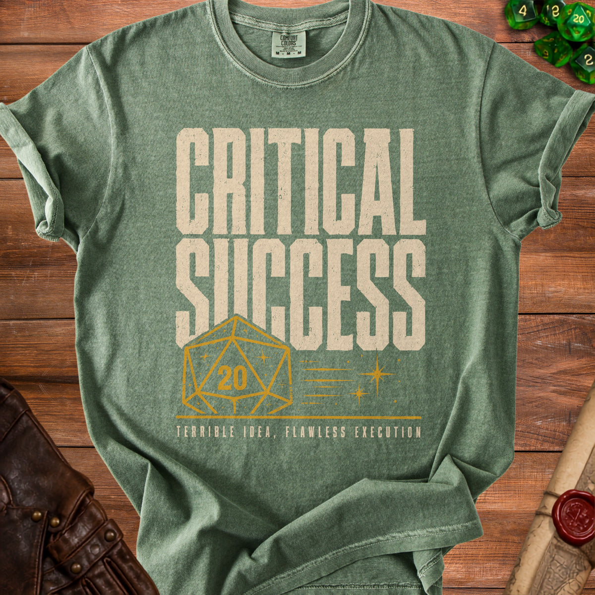 Green t-shirt with "CRITICAL SUCCESS" and a d20 die.