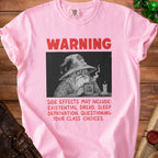 Pink t-shirt with a wizard graphic and text warning side effects.