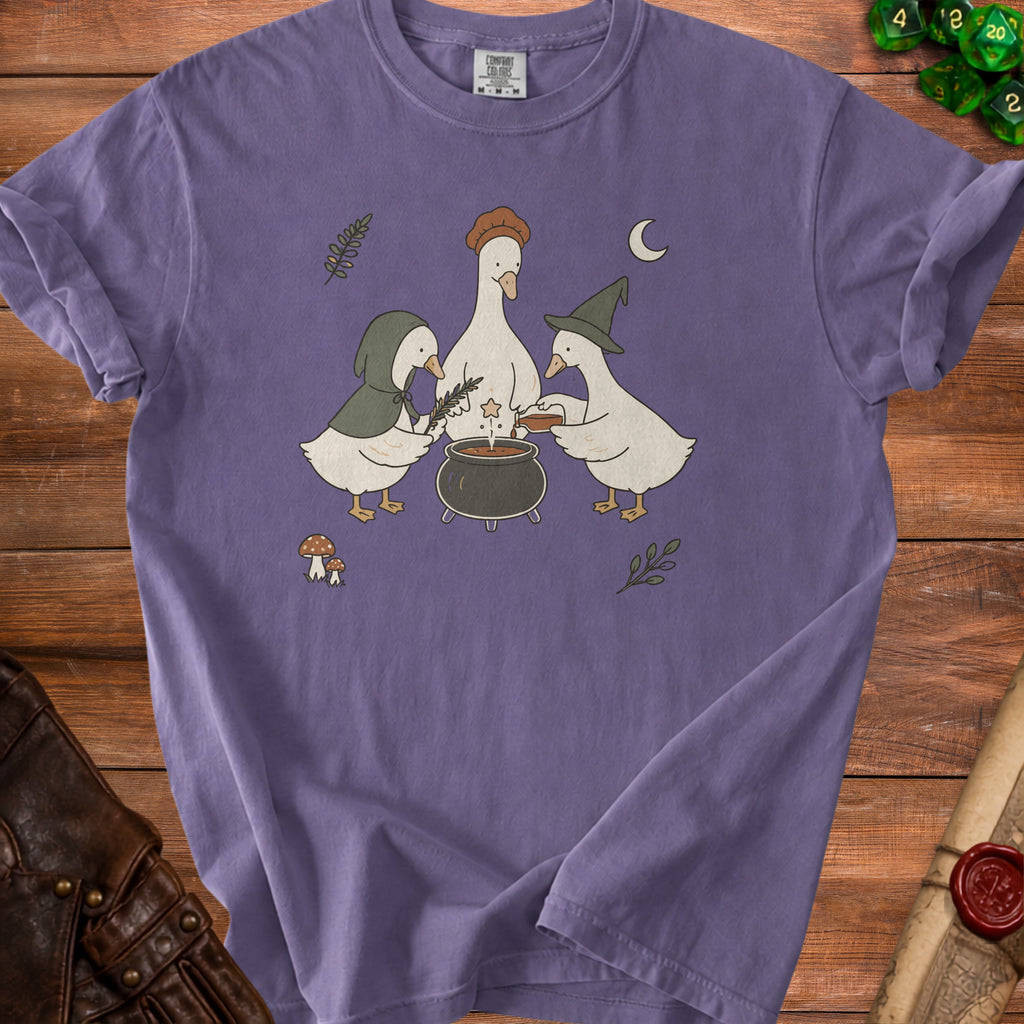 Three cartoon geese are making a potion in a cauldron under a crescent moon.