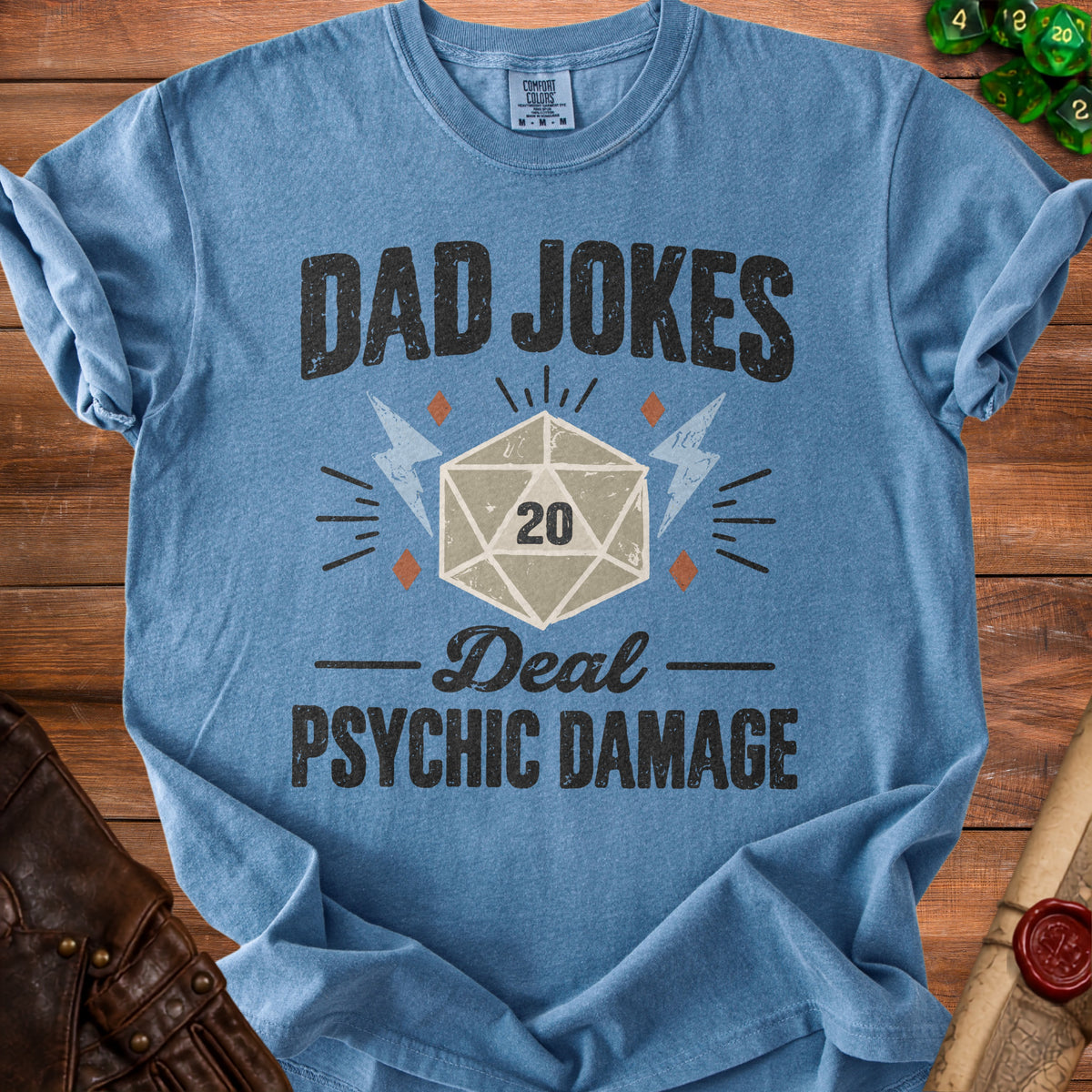 Blue t-shirt with "Dad Jokes Deal Psychic Damage" and a d20 die graphic.