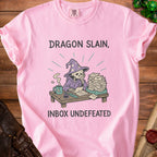 Pink t-shirt with skeleton wizard and text "Dragon Slain, Inbox Undefeated".