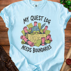 Light blue t-shirt with goblin illustration and text "My Quest Log Needs Boundaries."