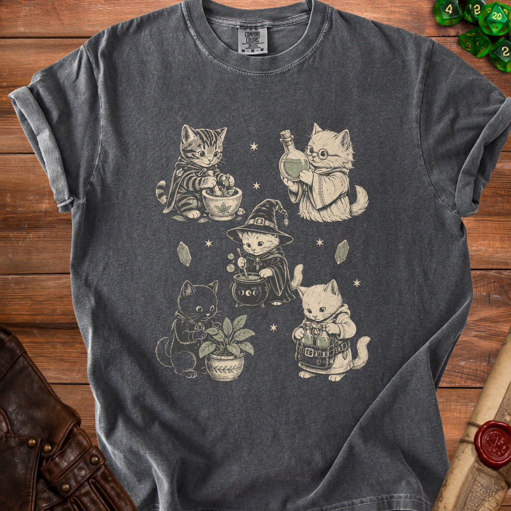 Dark gray t-shirt with illustration of five kittens in wizard attire.