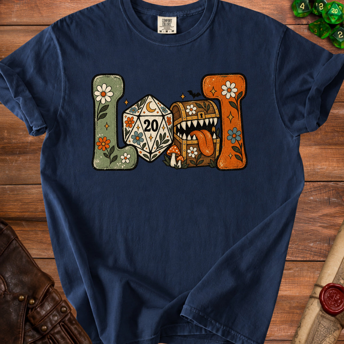 Navy t-shirt with retro graphic of dice, treasure chest, and flowers.