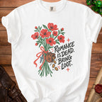White t-shirt with red poppies, dagger, money bag, and "Romance Is Dead. Bring Loot." text.