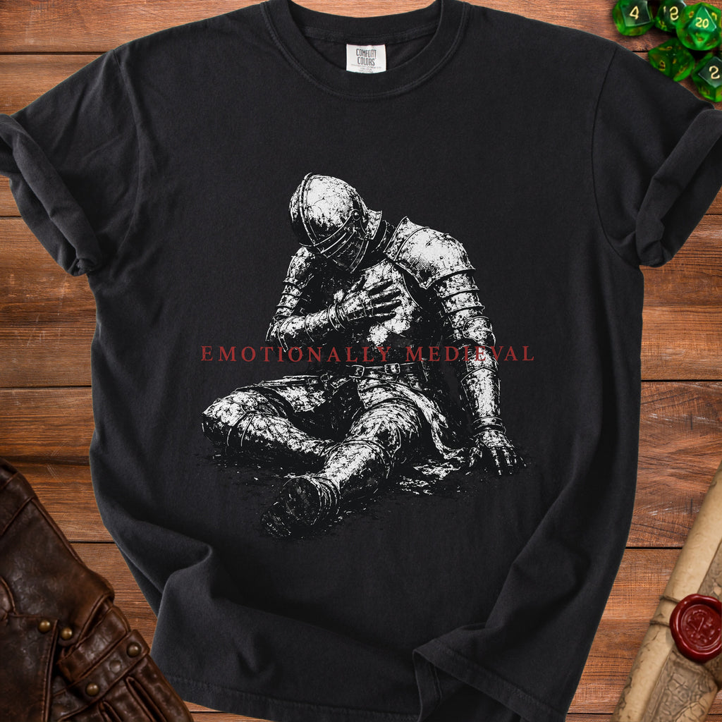 Black t-shirt with a seated knight graphic and "Emotionally Medieval" text.