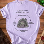 Light purple t-shirt with "Manage Your Social Battery" graphic showing a cycle.