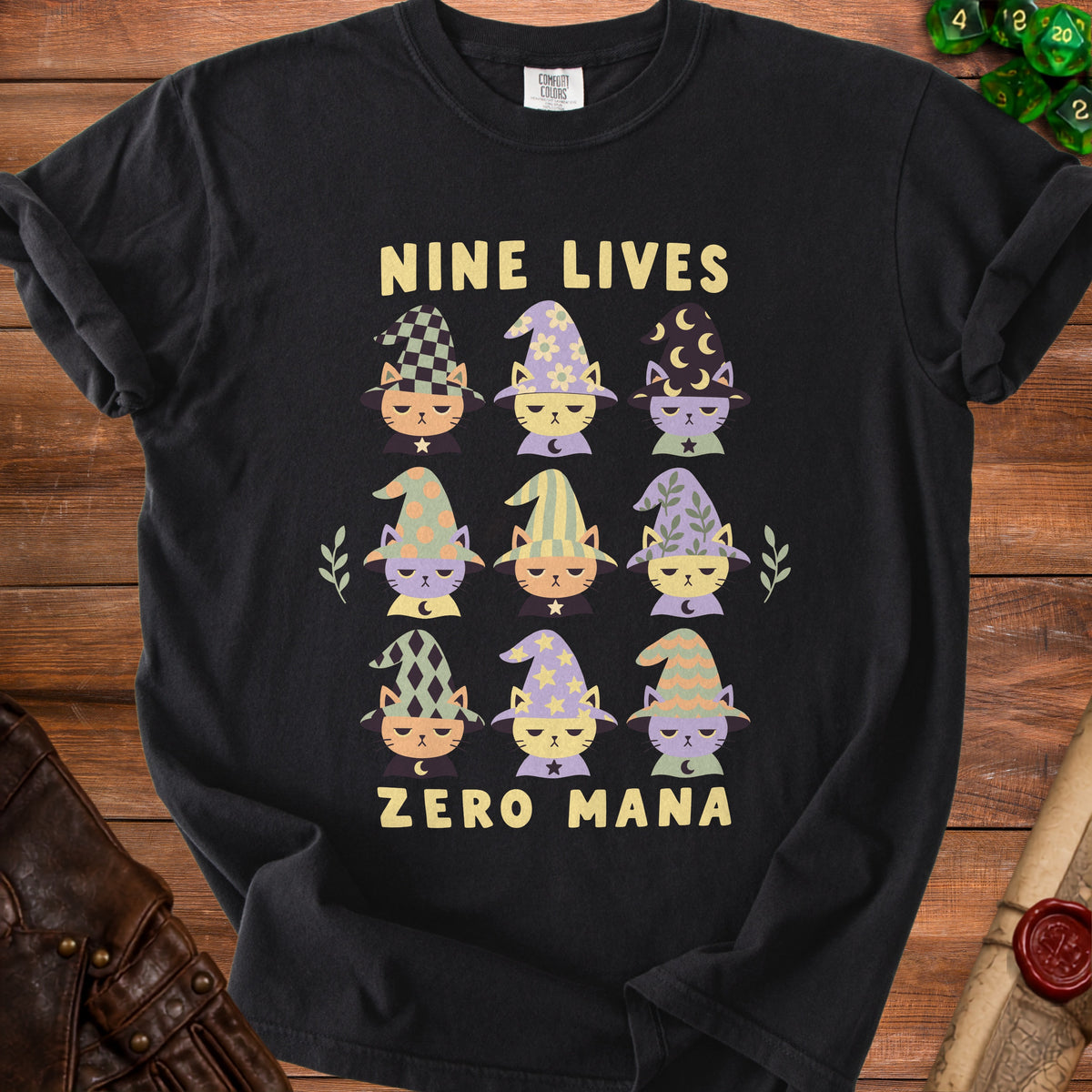 Black t-shirt with nine cats in wizard hats and text "NINE LIVES ZERO MANA".