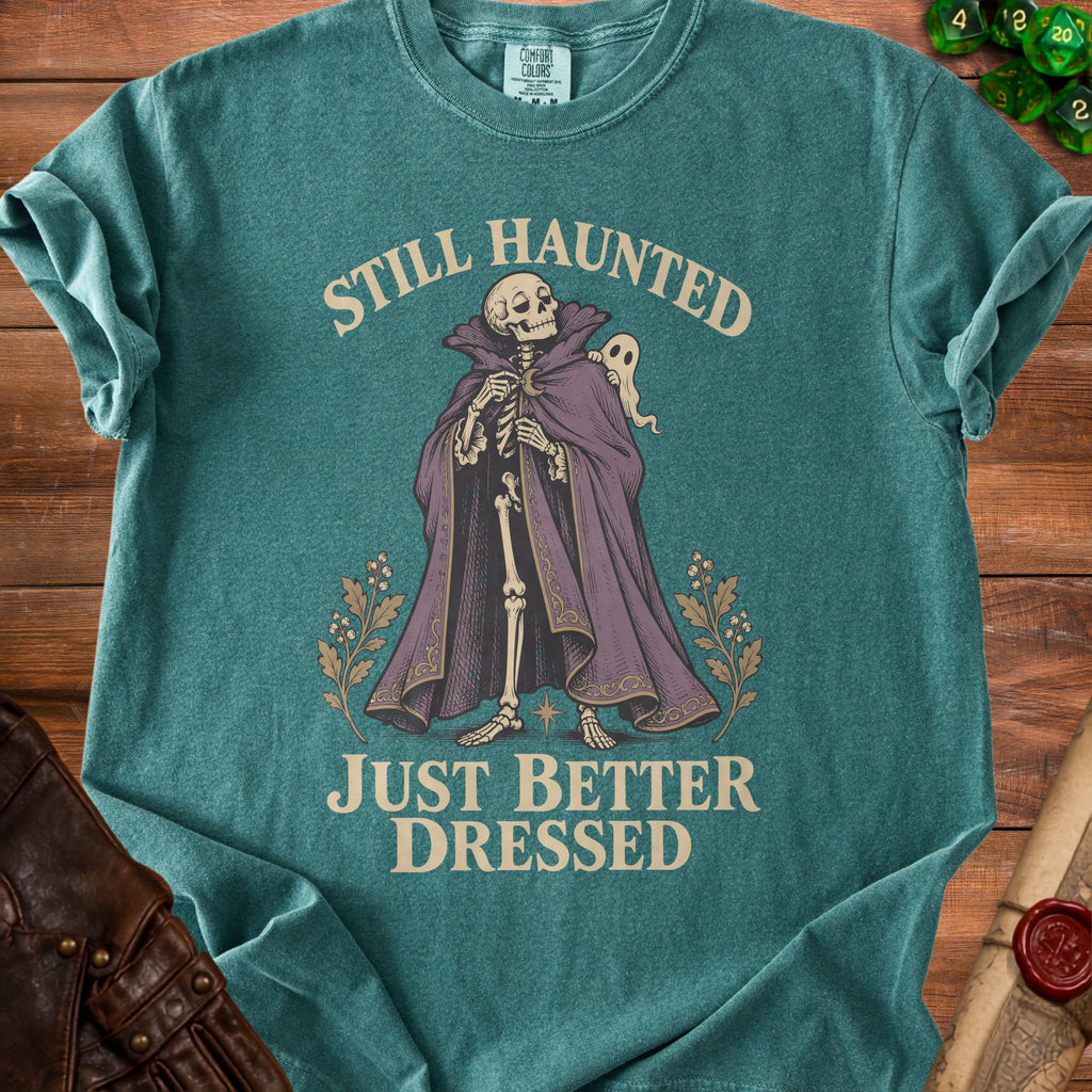 Skeleton in a cape with a ghost, "Still Haunted Just Better Dressed".