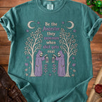 Teal t-shirt with "Be the ancestor they summon when shit gets real" text and grim reaper graphics.