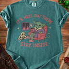 Goblin in robe drinking from pentagram mug with text "It's Hell Out There Stay Inside".