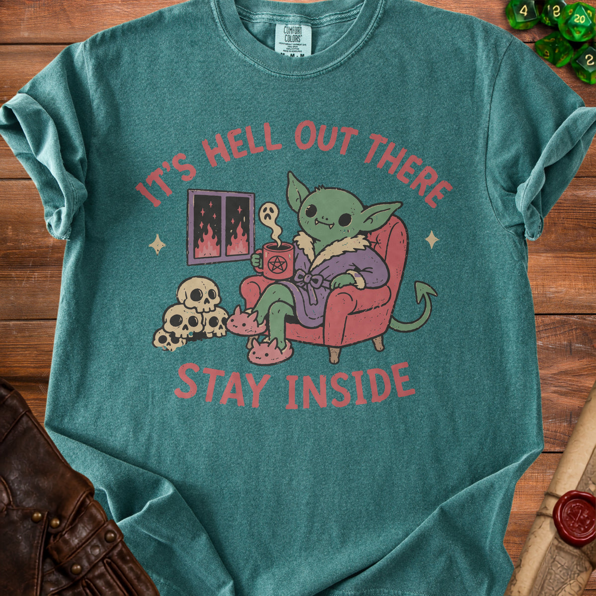 Goblin in robe drinking from pentagram mug with text "It's Hell Out There Stay Inside".