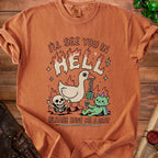 Orange t-shirt graphic with text "I'LL SEE YOU IN HELL PLEASE SAVE ME A SEAT".