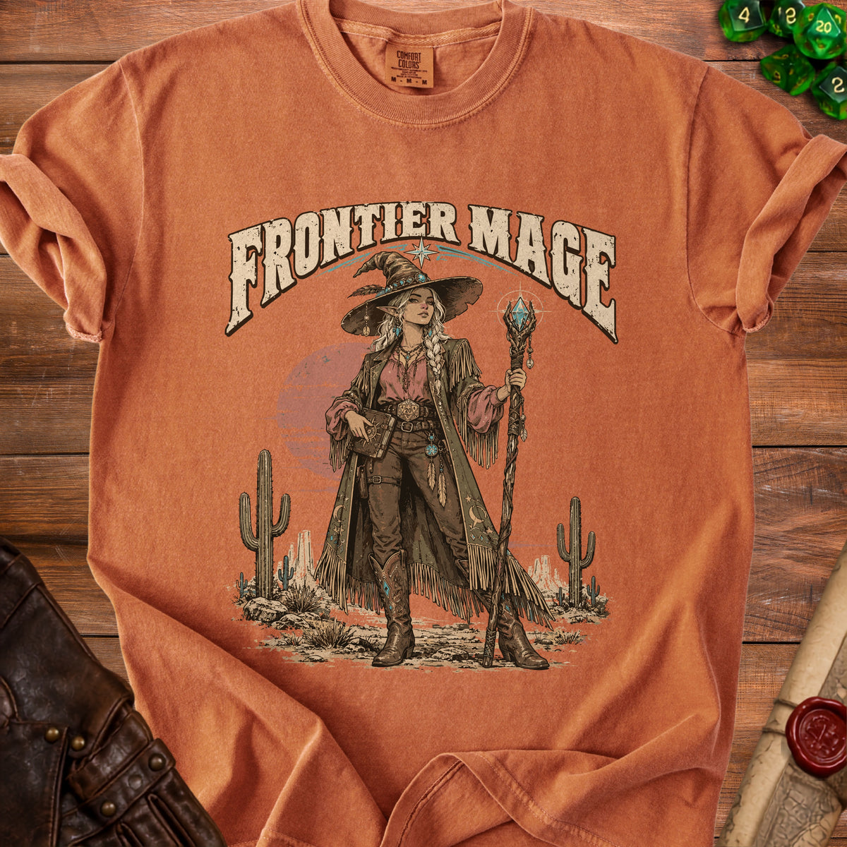 T-shirt with "FRONTIER MAGE" text and desert witch graphic.